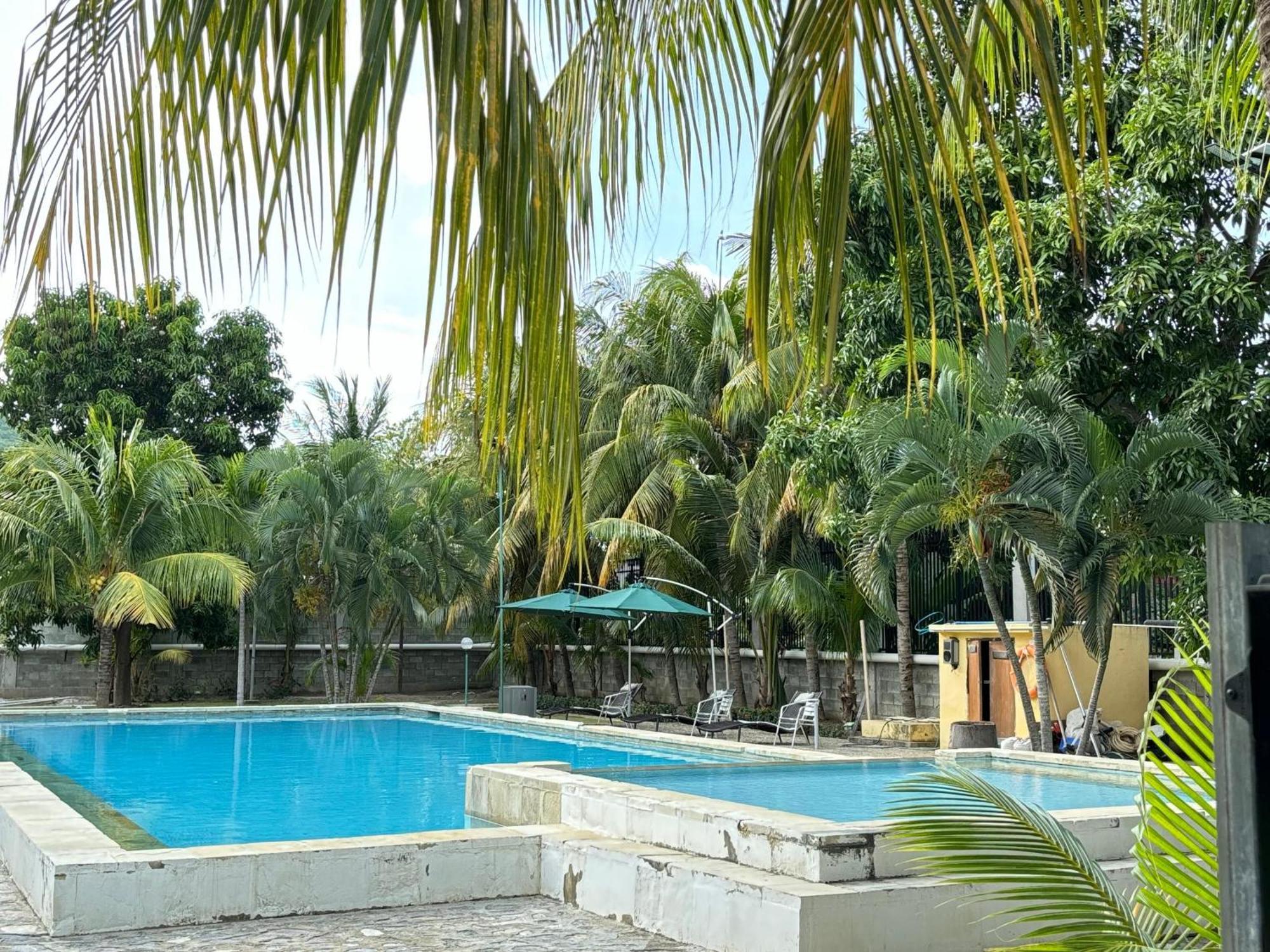 Palm Malinamoc Hotel Dili Exterior photo